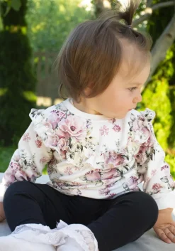 Bluza w kwiaty z falbanką