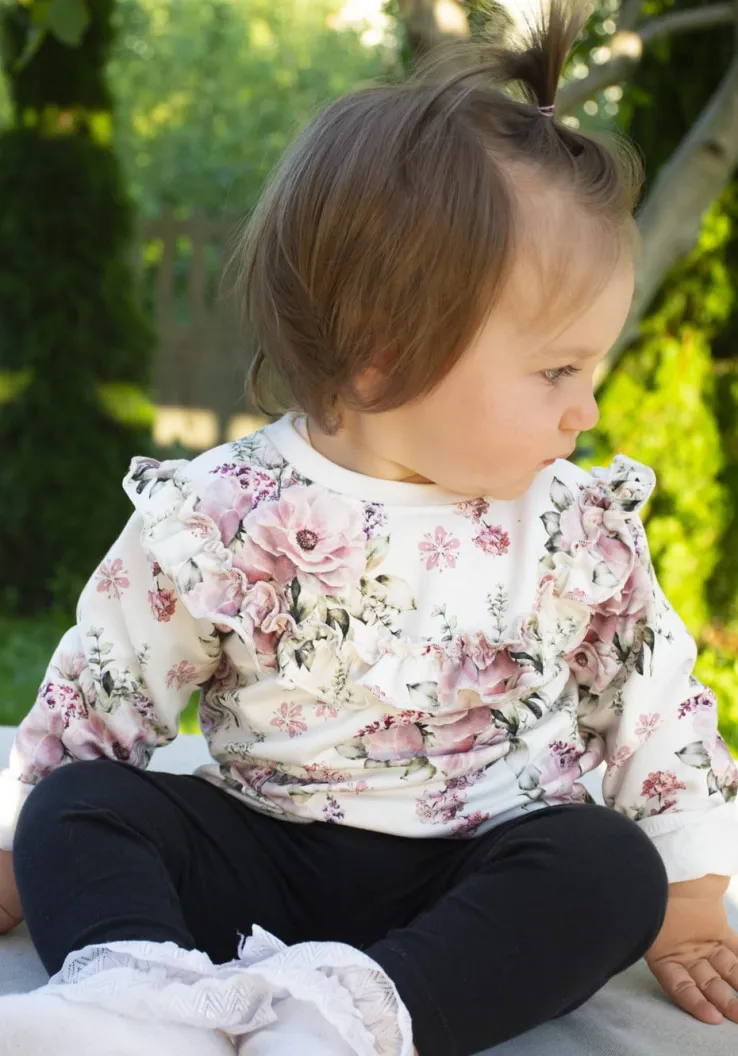 Bluza w kwiaty z falbanką