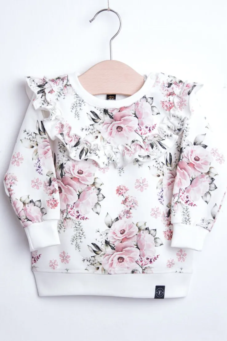 Bluza w kwiaty z falbanką