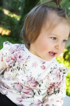 Bluza w kwiaty z falbanką