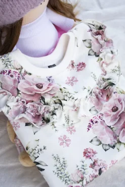 Bluza w kwiaty z falbanką