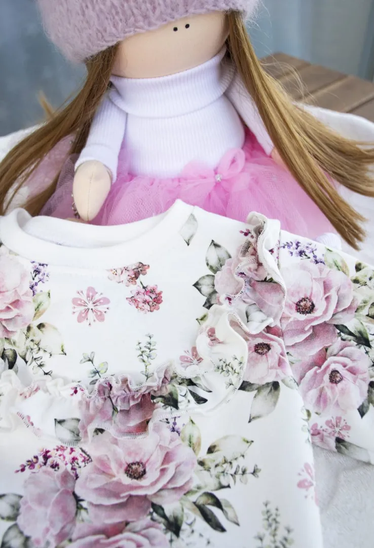 Bluza w kwiaty z falbanką