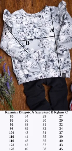 Bluza z falbankami przy rękawach niebieskie róże