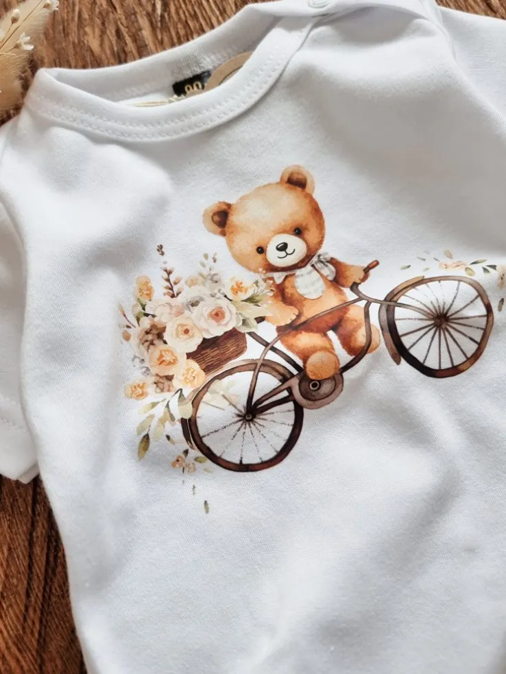 Body niemowlęce misio na rowerze