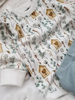 Body z falbankami przy rękawach tajemniczy ogród