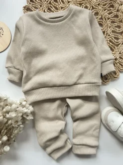 Jasnobeżowy komplet prążkowany (bluza + getry)