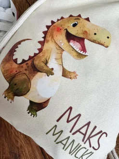 Worek dla dziecka z nadrukiem wesołego dinozaura